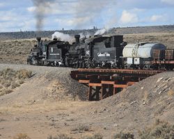 As we cross Hangman's Trestle, we get the first good look from the train at 463 and 487 working their way up across the desert.