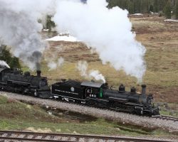 We skipped the Los Pinos run-by, but did manage to fit in the one scheduled at Tanglefoot, just below Cumbres Pass summit. Here's 463 marching past on the lower track.