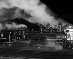 It would appear that 463 was highballing past the Chama depot, but in all reality, it's just sitting there with some cooperative breeze.