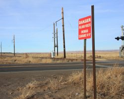 At the AZ 98 road crossing, the wires are cut and tied off and the gates are down. The sign just doesn't hold the same significance it used to.