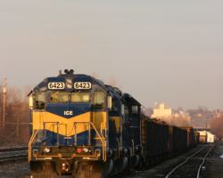 The first IC&E train of the trip, 6423 awaits departure southbound in the evening hours at Nahant.