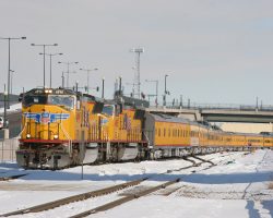 Arriving at Denver around 1220h after the trip from Greeley. Lead power is UP 4898 and 4965, followed by 10 passenger cars and two power cars.