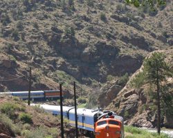 As the train passes under US 50, it disappears into the Royal Gorge