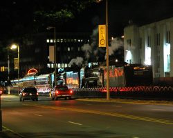 Thursday's run was just a dinner train out to Walcott and back. My dad and I were outside in Walcott when it came into town, and decided to chase it back to the Rock Island yard. Here it is shoving back into the loading area.