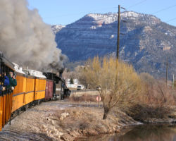 Out of Durango, the line turns and parallels US 550 through a long, flat valley