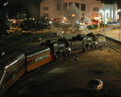 Having unloaded all of the passengers from Thursday night's dinner train, the two QJs push the cars back into the track where they'll be stored for the night.