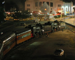 Having unloaded all of the passengers from Thursday night's dinner train, the two QJs push the cars back into the track where they'll be stored for the night.
