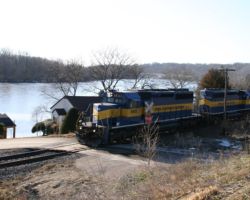 A bit washed out, but I still like this shot of 6413 passing along the river.