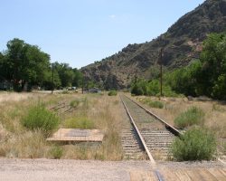 The first easily accessible grade crossing west of Parkdale is Cotopaxi. Looking east, back towards Parkdale, with no sign of recent traffic in the flangeways.