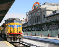 Pulled into the track at Union Station with the iconic "Travel by Train" sign in the background.