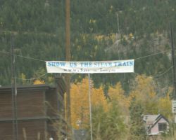 At least some of the local Georgetown residents are very aware of what they're losing - evidence this very telling banner over Georgetown's main road that says "Show Us The Steam Train" For more info, see SaveTheTrain.org (website now gone)