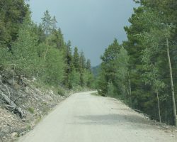 It's the afternoon, and like most afternoons along the Continental Divide in Colorado, the storms are brewing. This shot looks east down the right-of-way just to the west of Midway Tank