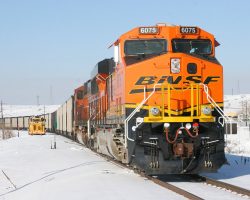 We'd heard a rumor that the train would run wrong-way on the northbound main from Littleton to Palmer Lake, but this confirmed it. It's a loaded coal train stopped at Louviers, awaiting helpers from Big Lift. No way they're putting a hot passenger special behind this slug.