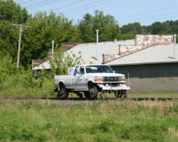 An Iowa, Chicago & Eastern pilot hyrail, running a few minutes ahead of the 261 to spot problems
