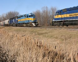 Two trains passing on Christmas Eve - one crew about to tie up, the other with many hours to go.