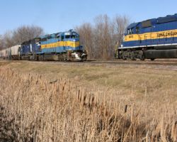 Two trains passing on Christmas Eve - one crew about to tie up, the other with many hours to go.