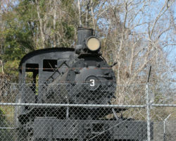 The thing's darn hard to photograph through the fence, but I suppose that's part of what keeps it safe way out here.