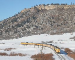 The regular southbound main is pretty easy to shoot at Larkspur, but trains running southbound on the northbound main pose a challenge. I still managed to get the bluff-in-the-background shot, though, just from a different spot. The scenery dwarfs the train, and this scenery is small by Colorado standards!