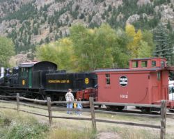 A father and his sons look at #8 on display in Georgetown