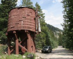 Tunnel Gulch Tank is the second of the three water tanks as you work your way up to the tunnel, a testament to how much water locomotives went through in those short but steep 13 miles. This tank replaced the original at Woodstock in 1885. It was restored in Sep-1969 by the Mile-Hi Jeep Club.