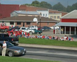 Lots and lots of people were out along the route - not just fans, either. A whole bunch of kids and presumably their teachers were sitting on the lawn in Wilton, IA, to watch the train go through.