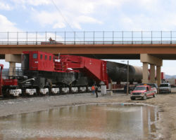 Backing under the US 160/350 bridge and onto the BNSF's Raton Subdivision.