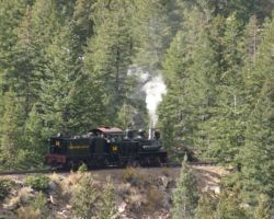 And here's 14, chasing along right after the train near the deck truss bridge
