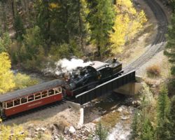 Having rounded the high bridge in darkness, 12 and the first eastbound break back into the sun crossing the lower plate girder bridge, only a few hundred yards from the Devil's Gate station.