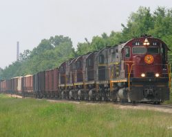 A&M C-420 44 leads five other units on this northbound Ft. Smith Turn, stopped short of the Arkansas River Bridge