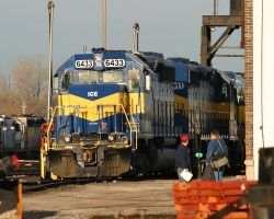 In the late afternoon hours of 30-Dec-2003, one of the crewmen prepares for another trip on 6433.