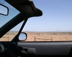 Like I said, with 2500 miles to go and 90+ degree weather, convertibles are the only way to go. (Okay, really it's I'm driving across the desert playing with the camera because I'm bored...)