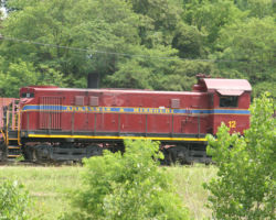 A rare Alco T-6 switcher, A&M 12, works as part of the power for the local switch job in Van Buren