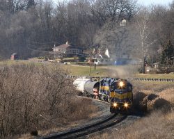A wider shot of ICE 6413 north, as seen in chapter 1, except from a wider angle so you can see the houses and trees along this part of the Mississippi