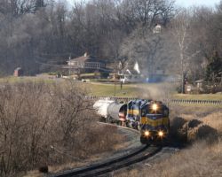 A wider shot of ICE 6413 north, as seen in chapter 1, except from a wider angle so you can see the houses and trees along this part of the Mississippi