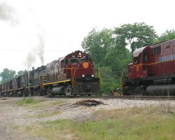 The northbound Ft. Smith Turn pulls by the southbound passenger train