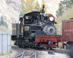 12, having been run around the train, prepares to couple on to the rear for the trip back down.