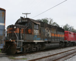 The trailing unit on the northbound is the incredibly ugly HATX 500, an ex-B&M/Guilford GP40-2.