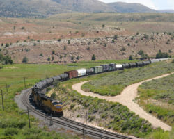 Finally, we see it rounding the curve under US 6 between Kyune and Colton