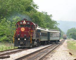 Backing out onto the main behind the freight to continue its trip south