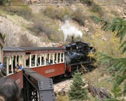 As we're headed down off the fill, we cross Clear Creek the first time on the pin truss bridge