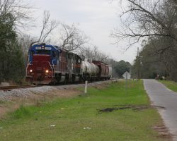 Here's the opposing, southbound local at Baconton, GA. I caught it somewhat by accident, as when I looked down the long road off the main highway, I saw the crossing flashers turn on.