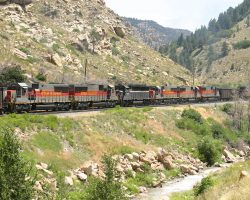 Six mid-train pushers help shove this one over the hill