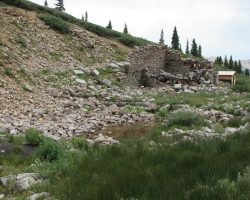 Looking at the southwest corner from the other end, the wreckage of the water tank is evident. Also, that puddle of water in the middle is actually the turntable pit - notice you call still almost make out the circular ring of stones forming the pit wall.