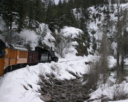 Perhaps built a bit too close to the river, there are numerous signs of old washouts. Look carefully below the train and you'll see rails with ties still attached, washed into the river years ago.