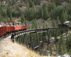 Like the other scheduled trains before it, 14 follows along behind to lend a hand on the uphill run