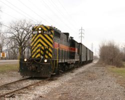 Pushing (yes, this is the rear) the four empties back towards the Milan wye.