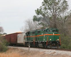 Since the GFRR on opposite sides of Moultrie was originally built by different railroads, the trackage is arranged strangely. The mainline actually goes around town on a bypass running around the northeast side. Here's the southbound turn on the bypass, just out of Schley Junction.