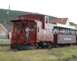 Having no turning facility at the top (the line ends on a high ridge now), they push the train uphill, lead by a special caboose