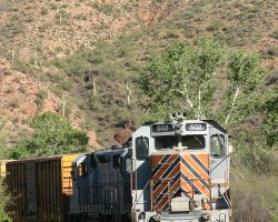 A local that had followed the OT-1 north sits and idles on the main at Ray Junction.