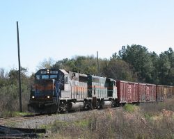 Between Adel and Sparks (as well as south to Valdosta), the GFRR uses Norfolk Southern track. Here's the northbound with 517 in the lead, coming through the wye in downtown Adel and getting ready to enter the NS.